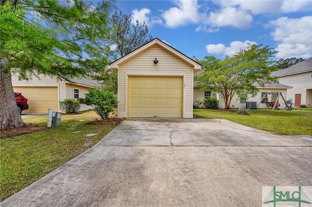 104 Coach House Sq, Pooler, GA 31322 - view of front of house featuring a front lawn, an outbuilding, driveway, and a garage