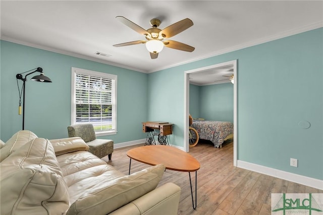 204 Wheeler St, Savannah, GA 31405 - living area featuring visible vents, ceiling fan, crown molding, baseboards, and light wood-style floors