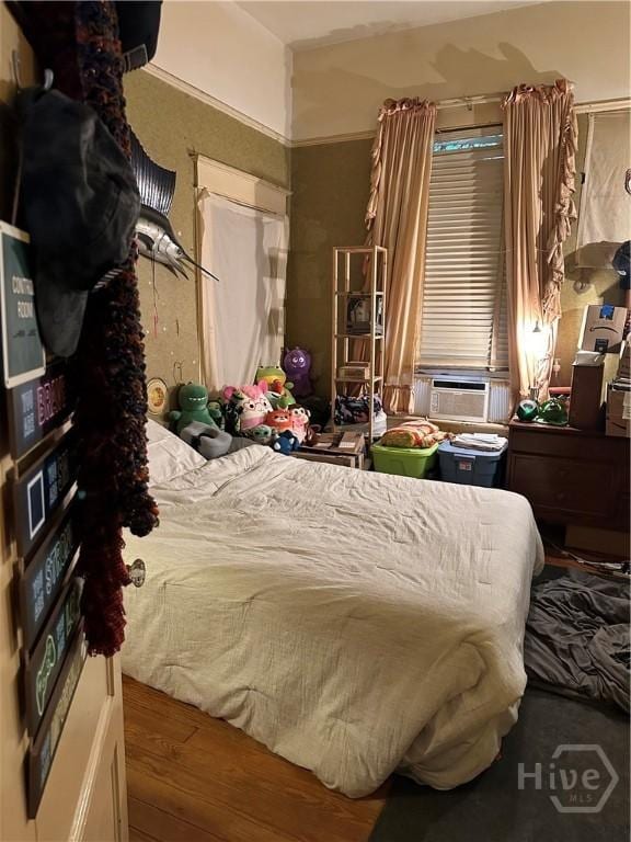 bedroom featuring cooling unit