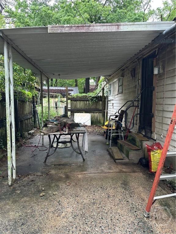 view of patio / terrace with fence and entry steps