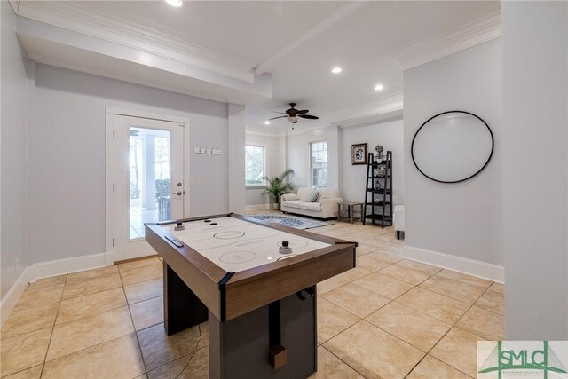 playroom with light tile patterned flooring, recessed lighting, crown molding, a ceiling fan, and baseboards