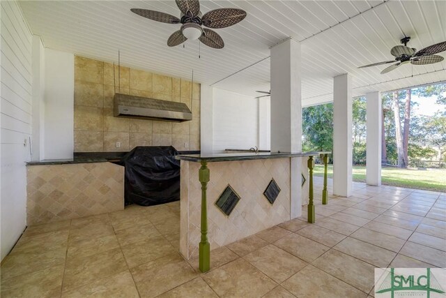 view of patio / terrace featuring a ceiling fan and grilling area