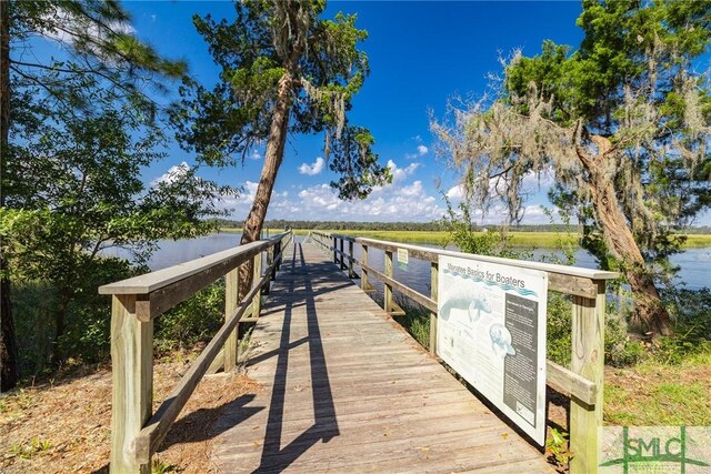 dock area featuring a water view