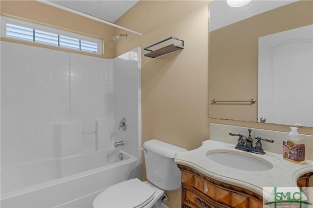 full bathroom with toilet, bathing tub / shower combination, and vanity