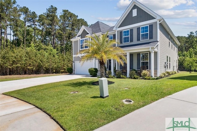 view of front of house featuring a garage, a front lawn, board and batten siding, a porch, and driveway