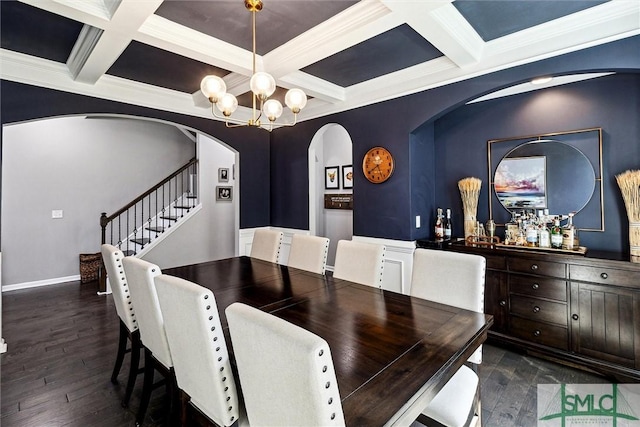dining space with coffered ceiling, beam ceiling, arched walkways, and an inviting chandelier