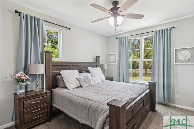bedroom featuring carpet, baseboards, and a ceiling fan