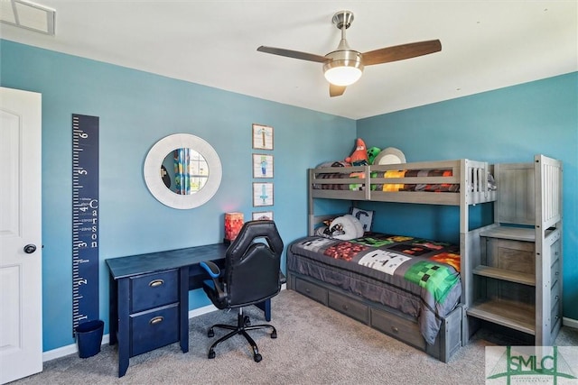 bedroom featuring a ceiling fan, carpet flooring, visible vents, and baseboards