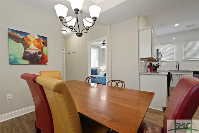 856 E 35th St, Savannah, GA 31401 - dining space with a chandelier, dark wood finished floors, a ceiling fan, and recessed lighting