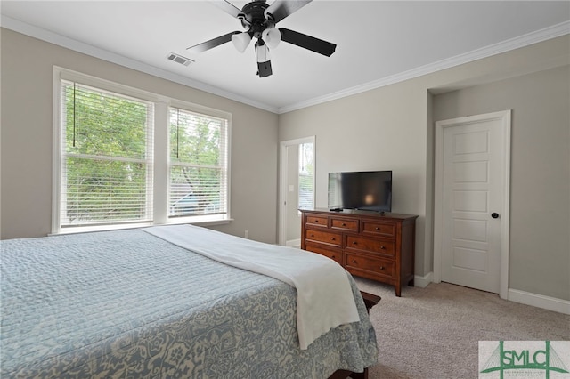 856 E 35th St, Savannah, GA 31401 - bedroom with multiple windows, light carpet, baseboards, and ornamental molding