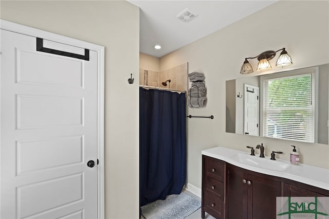 856 E 35th St, Savannah, GA 31401 - bathroom with visible vents, baseboards, vanity, and a shower with shower curtain