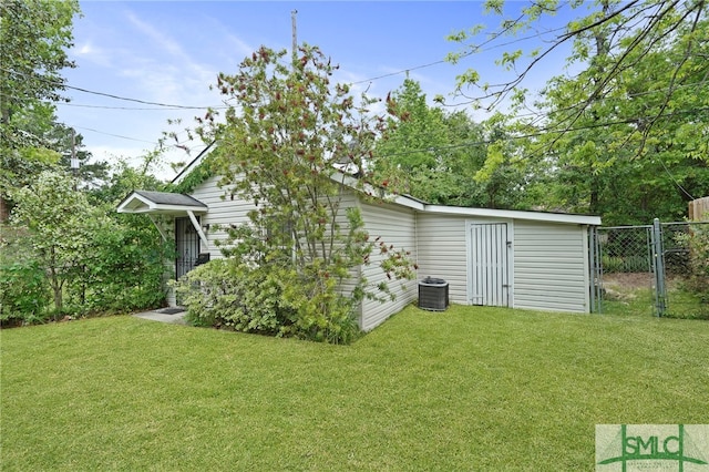 856 E 35th St, Savannah, GA 31401 - exterior space featuring a yard, cooling unit, and fence