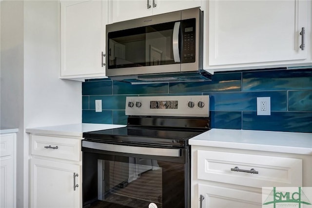 4 Tantallon Ct, Pooler, GA 31322 - kitchen featuring backsplash, appliances with stainless steel finishes, light countertops, and white cabinetry