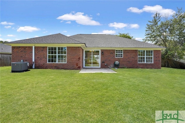 4 Tantallon Ct, Pooler, GA 31322 - rear view of house with a lawn, brick siding, fence, a patio, and central air condition unit