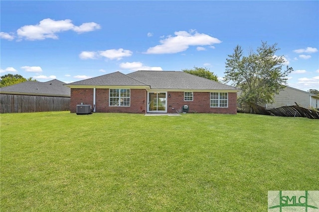4 Tantallon Ct, Pooler, GA 31322 - back of house featuring central air condition unit, fence, brick siding, and a lawn