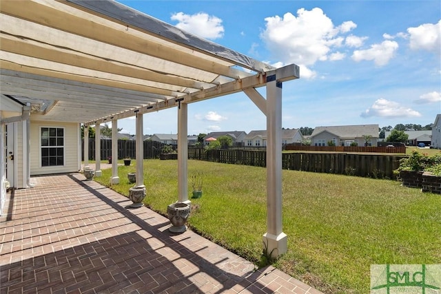 view of patio / terrace with a pergola, a fenced backyard, and a residential view