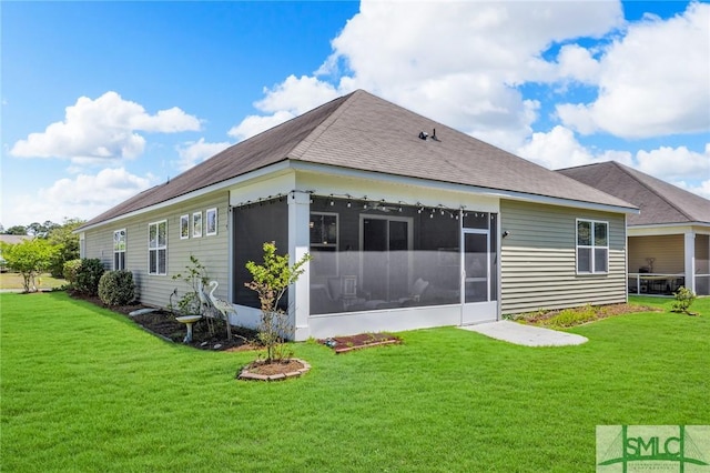 20 Baraco Dr, Savannah, GA 31419 - rear view of house with a yard, roof with shingles, and a sunroom