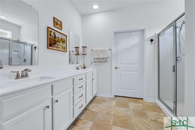 20 Baraco Dr, Savannah, GA 31419 - bathroom with a shower stall, stone finish floor, double vanity, and a sink