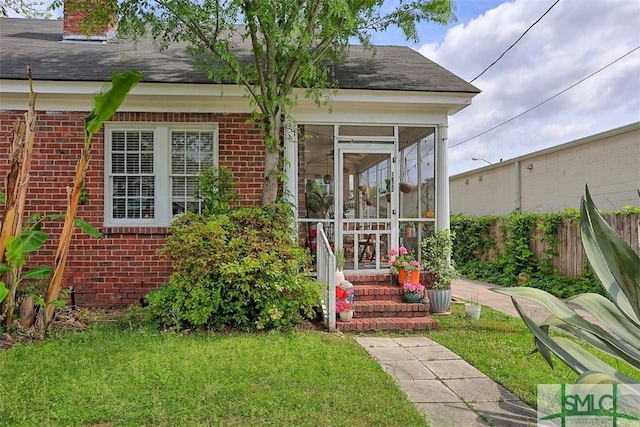 1020 Maupas Ave, Savannah, GA 31401 - view of outbuilding with a sunroom