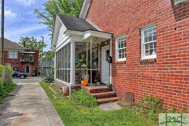 1020 Maupas Ave, Savannah, GA 31401 - entrance to property featuring ceiling fan and brick siding