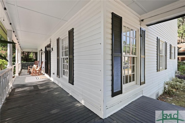 wooden deck featuring a porch