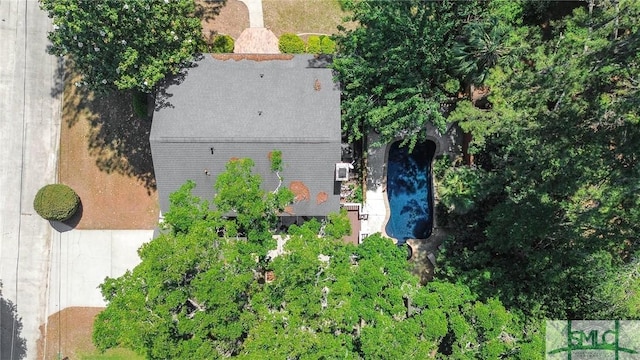 view of subject property featuring a pool