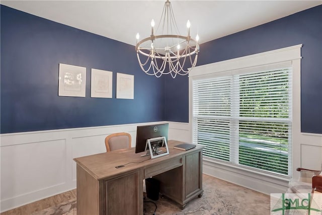 195 Wildlife View Ct N, Richmond Hill, GA 31324 - home office with a chandelier, a wainscoted wall, and a decorative wall