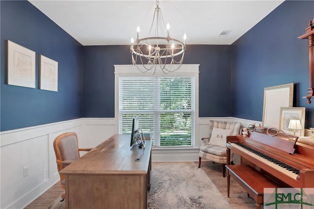 195 Wildlife View Ct N, Richmond Hill, GA 31324 - office with a chandelier, wood finished floors, wainscoting, and a decorative wall