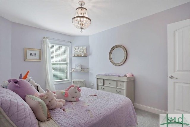 195 Wildlife View Ct N, Richmond Hill, GA 31324 - bedroom featuring carpet, baseboards, and a chandelier