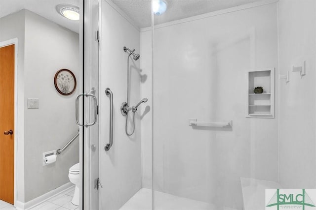 11 Fat Friars Retreat Retreat, Savannah, GA 31411 - bathroom featuring a textured ceiling, a stall shower, toilet, and tile patterned floors