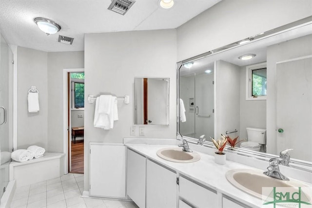 11 Fat Friars Retreat Retreat, Savannah, GA 31411 - bathroom with a shower stall, tile patterned floors, double vanity, and toilet