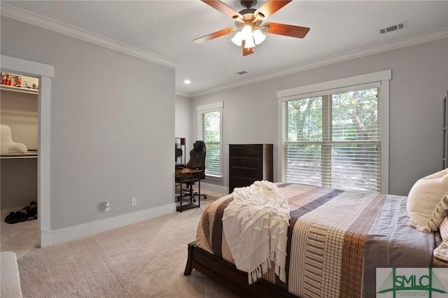 bedroom with carpet, ornamental molding, baseboards, an office area, and ceiling fan