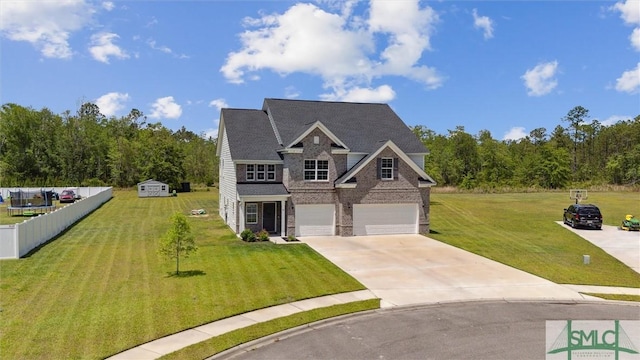 89 Evan Wade Ct NE, Ludowici, GA 31316 - view of front of property featuring driveway, a garage, stone siding, and brick siding