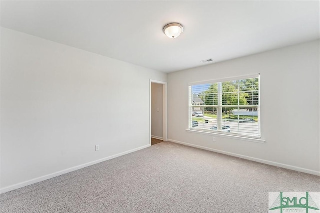 89 Evan Wade Ct NE, Ludowici, GA 31316 - empty room featuring baseboards and carpet flooring