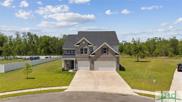 89 Evan Wade Ct NE, Ludowici, GA 31316 - craftsman-style house featuring driveway, an attached garage, and brick siding