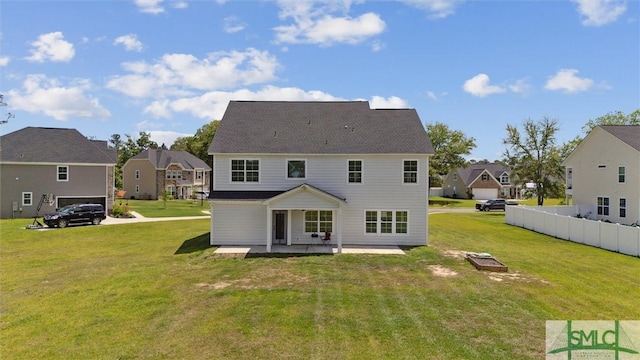 89 Evan Wade Ct NE, Ludowici, GA 31316 - back of property with a residential view and a patio