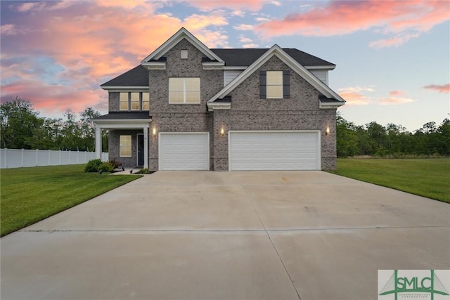 89 Evan Wade Ct NE, Ludowici, GA 31316 - view of front of home featuring brick siding, a garage, and driveway