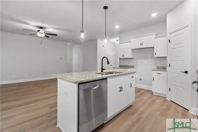 333 Crosswinds Dr, Rincon, GA 31326 - kitchen featuring a sink, stainless steel dishwasher, ceiling fan, light wood-style floors, and a center island with sink