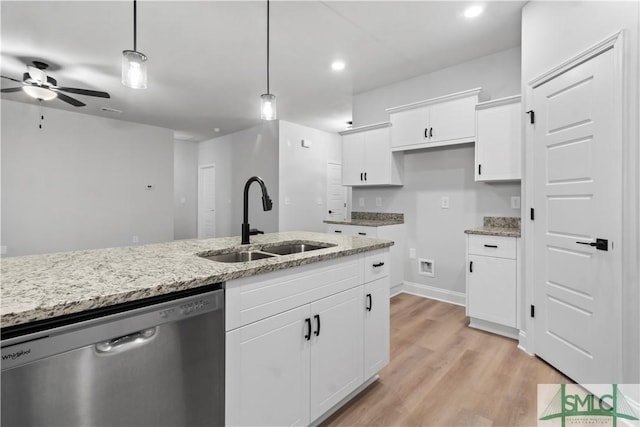 333 Crosswinds Dr, Rincon, GA 31326 - kitchen featuring dishwasher, a sink, ceiling fan, decorative light fixtures, and light wood-style flooring
