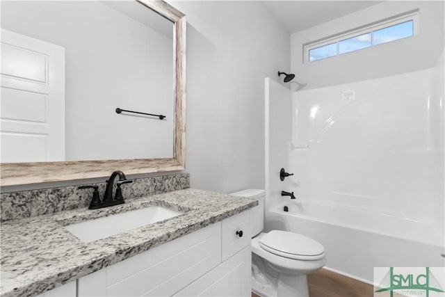 333 Crosswinds Dr, Rincon, GA 31326 - bathroom with toilet, bathing tub / shower combination, vanity, and wood finished floors