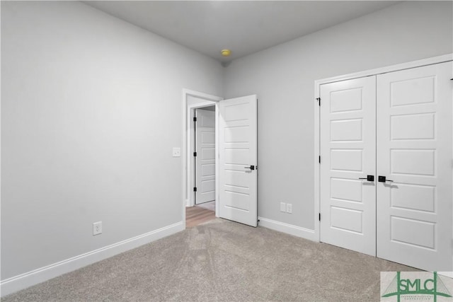 333 Crosswinds Dr, Rincon, GA 31326 - unfurnished bedroom with carpet, a closet, and baseboards