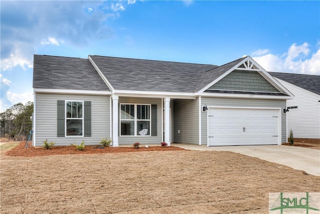 288 Timberlake Dr, Guyton, GA 31312 - view of front of home with driveway and an attached garage