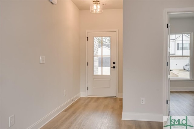 288 Timberlake Dr, Guyton, GA 31312 - entryway featuring light wood finished floors and baseboards