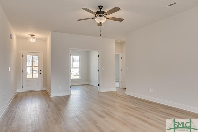 288 Timberlake Dr, Guyton, GA 31312 - entrance foyer with plenty of natural light, light wood-type flooring, ceiling fan, and baseboards