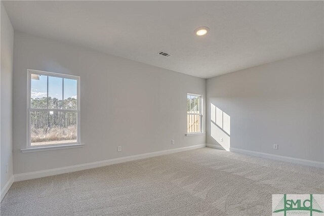 288 Timberlake Dr, Guyton, GA 31312 - unfurnished room featuring baseboards, plenty of natural light, light colored carpet, and recessed lighting