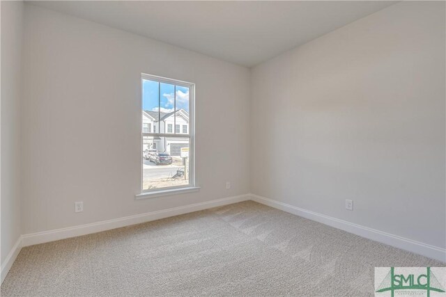 288 Timberlake Dr, Guyton, GA 31312 - empty room featuring light colored carpet and baseboards