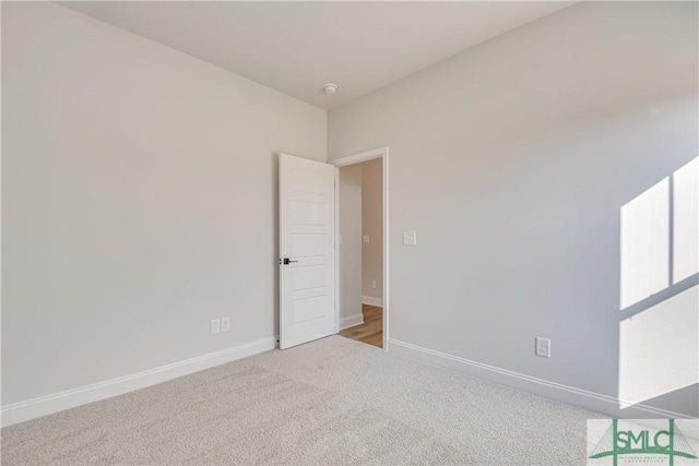 288 Timberlake Dr, Guyton, GA 31312 - empty room featuring baseboards and carpet flooring