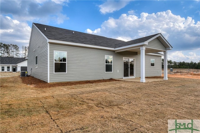 288 Timberlake Dr, Guyton, GA 31312 - rear view of house featuring a patio, cooling unit, and a lawn