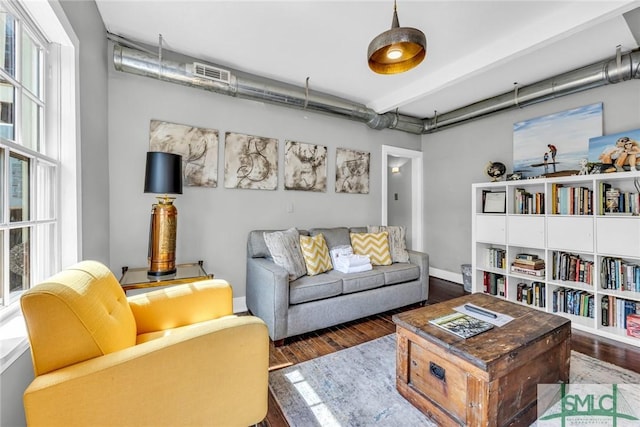 living area featuring wood finished floors