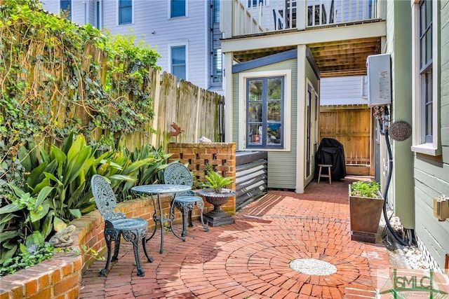 view of patio / terrace featuring fence and area for grilling